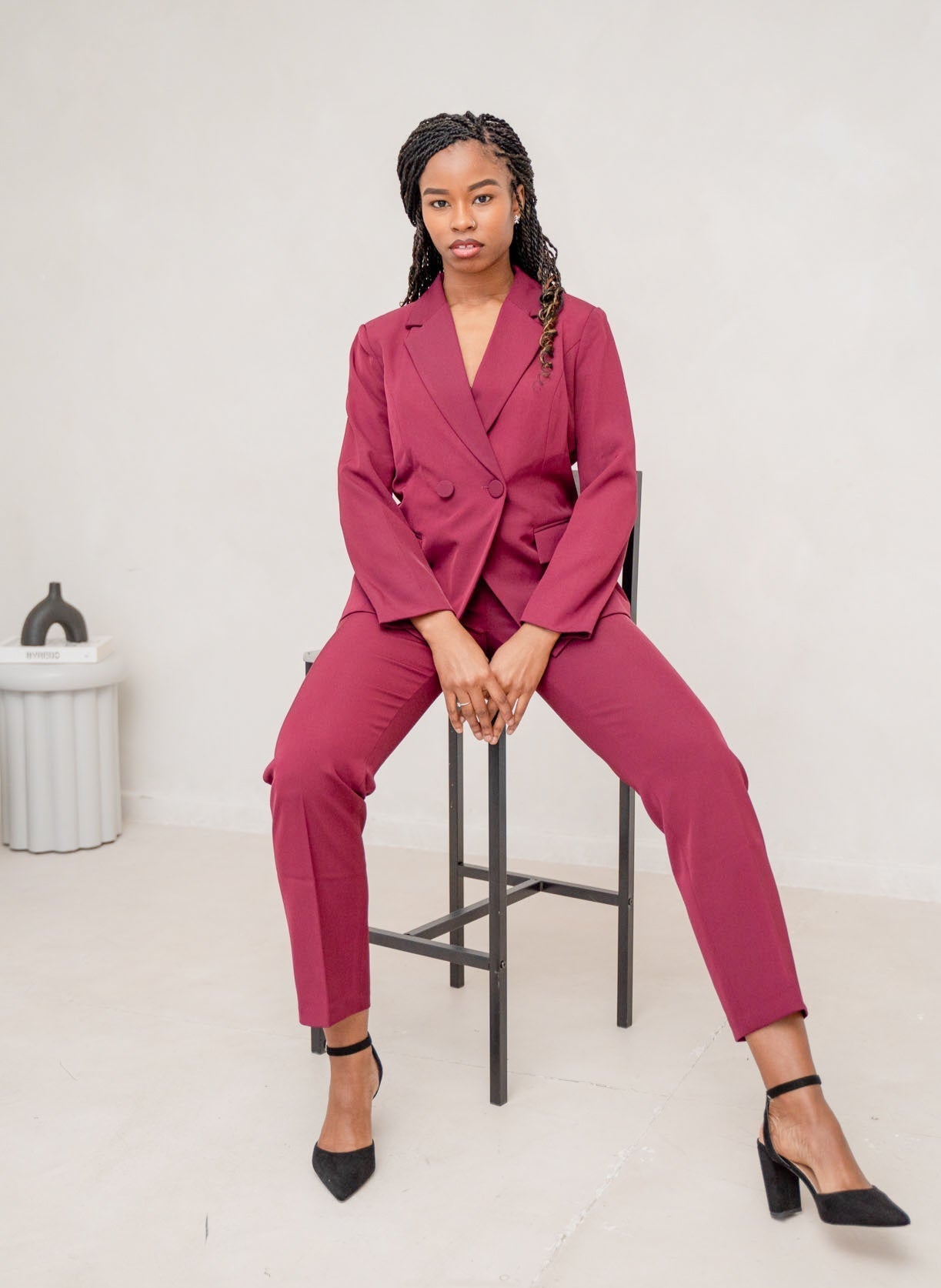 The burgundy 2-piece asymmetrical pantsuit (UK size 12)