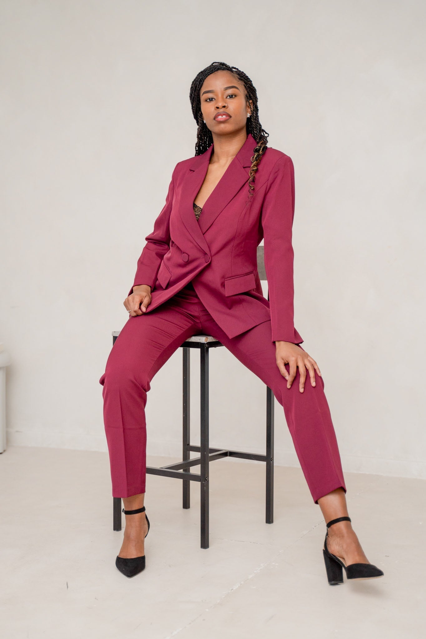 The burgundy 2-piece asymmetrical pantsuit (UK size 12)