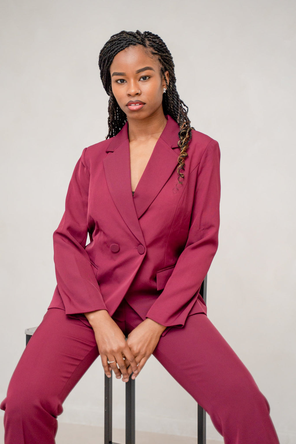 The burgundy 2-piece asymmetrical pantsuit (UK size 12)