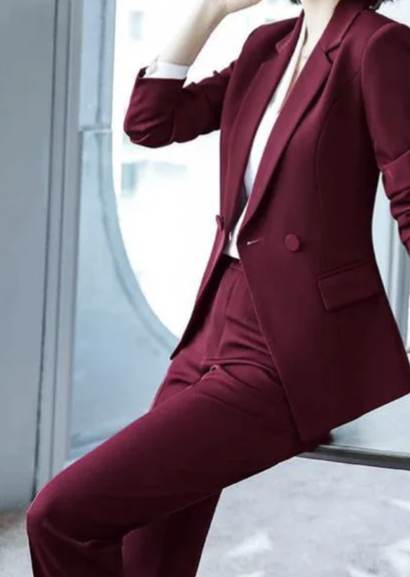 The burgundy 2-piece asymmetrical pantsuit (UK size 12)